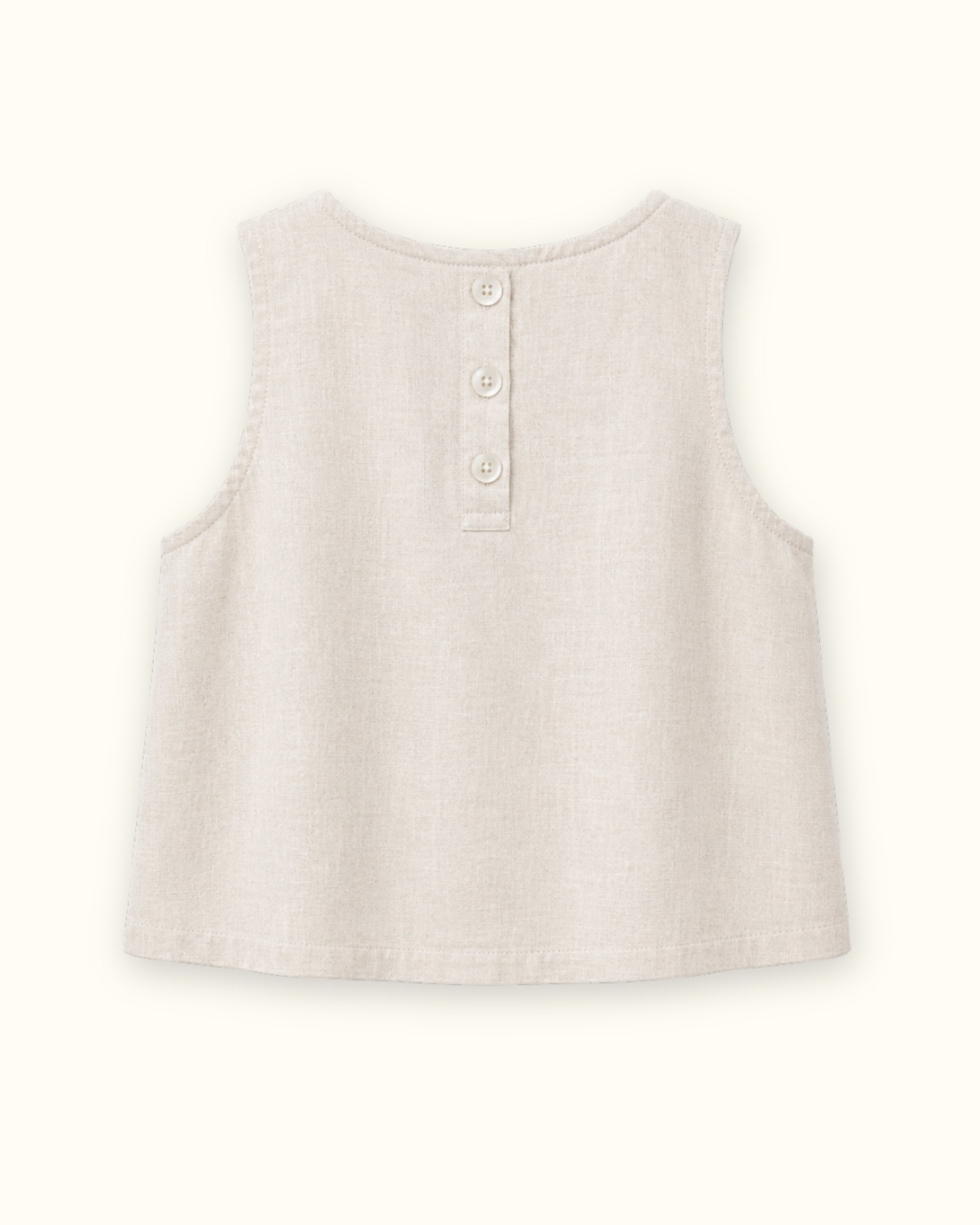 Top sin mangas de lino en Off White, vista trasera, mostrando el escote y la silueta sin mangas