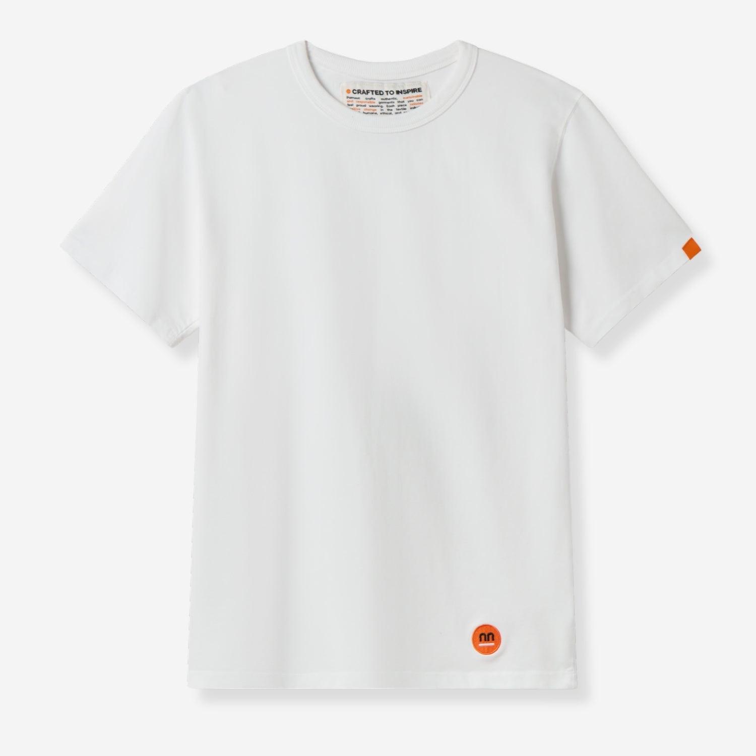 White t-shirt front view with a small orange Pamuuc logo at the bottom left hem and label inside the collar.