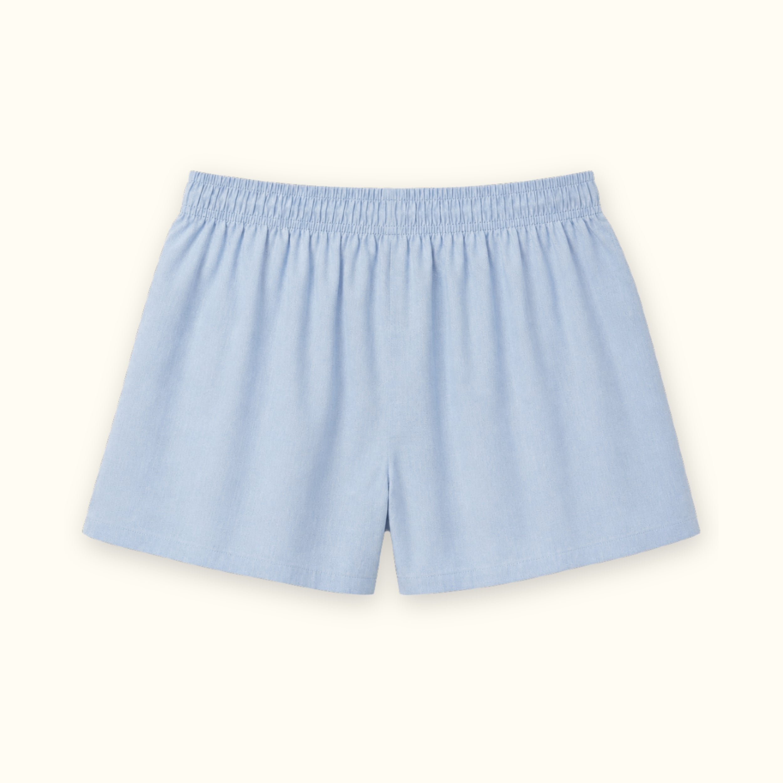Shorts boxer in cotone azzurri, vista posteriore, con vita e linea della gamba